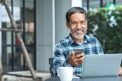 man scheduling his dental appointment at Prosthodontics Associates of New Jersey