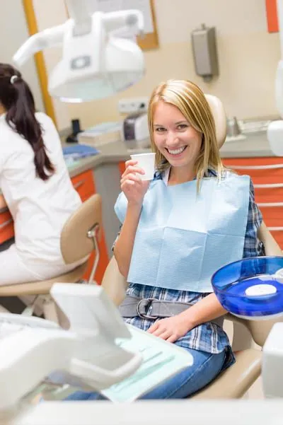 patient taking a sedative before her oral surgery procedure